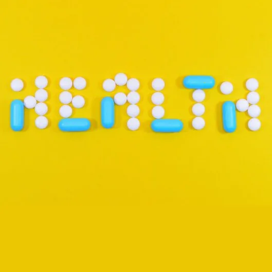 The word HEALTH made out of pills