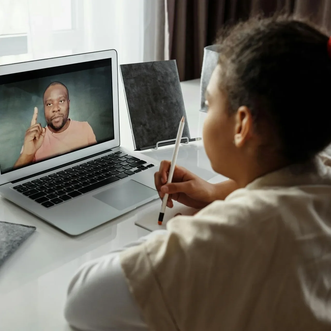 private tuition - Young girl learning from home