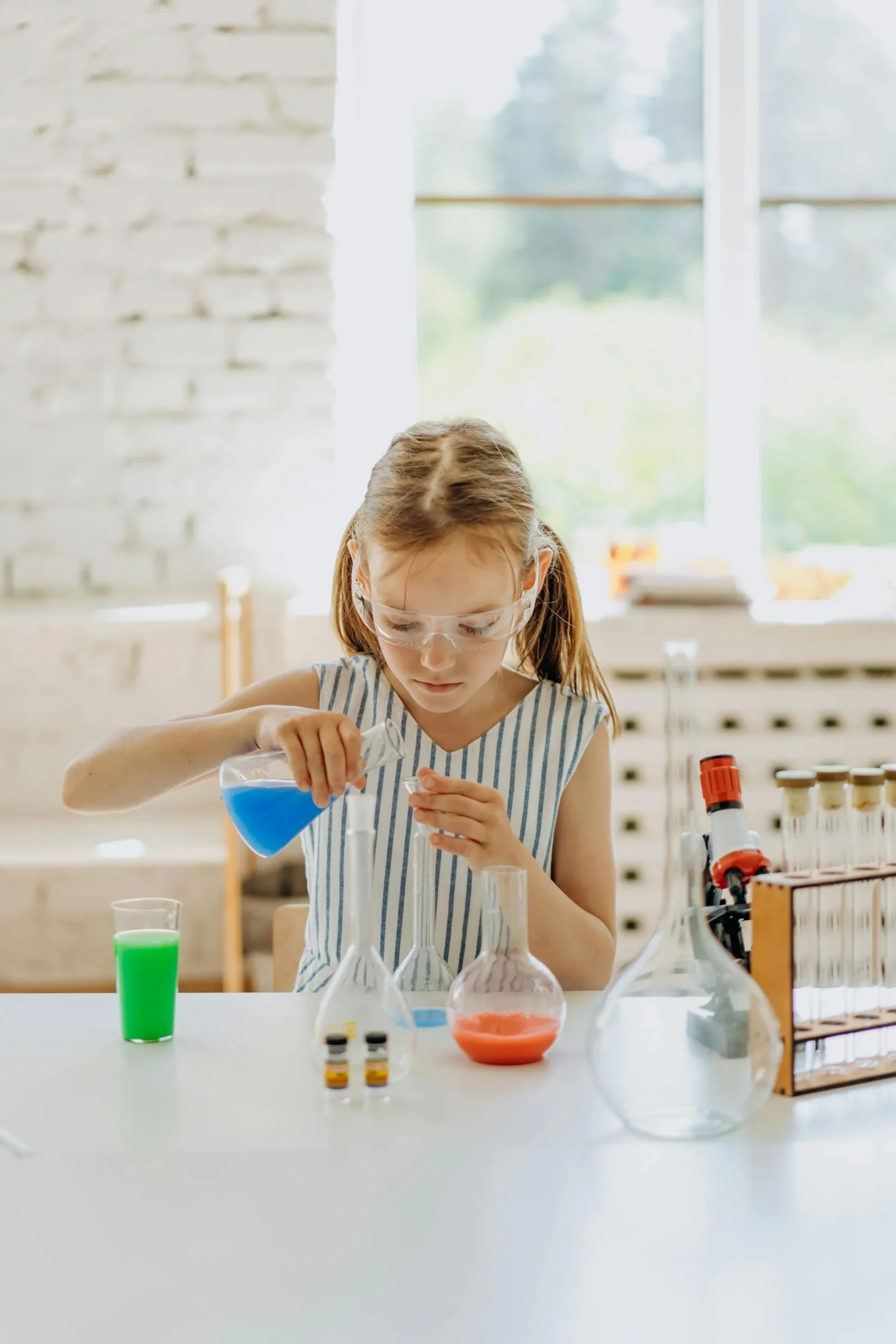 Young girl undertaking a science project